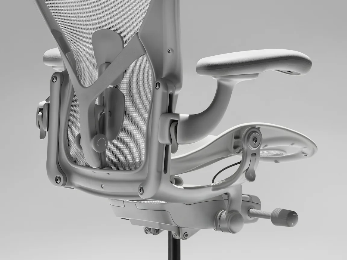 Close-up of the Herman Miller Aeron Size C PostureFit SL lumbar support showing dual-pad sacral and lumbar adjustment
