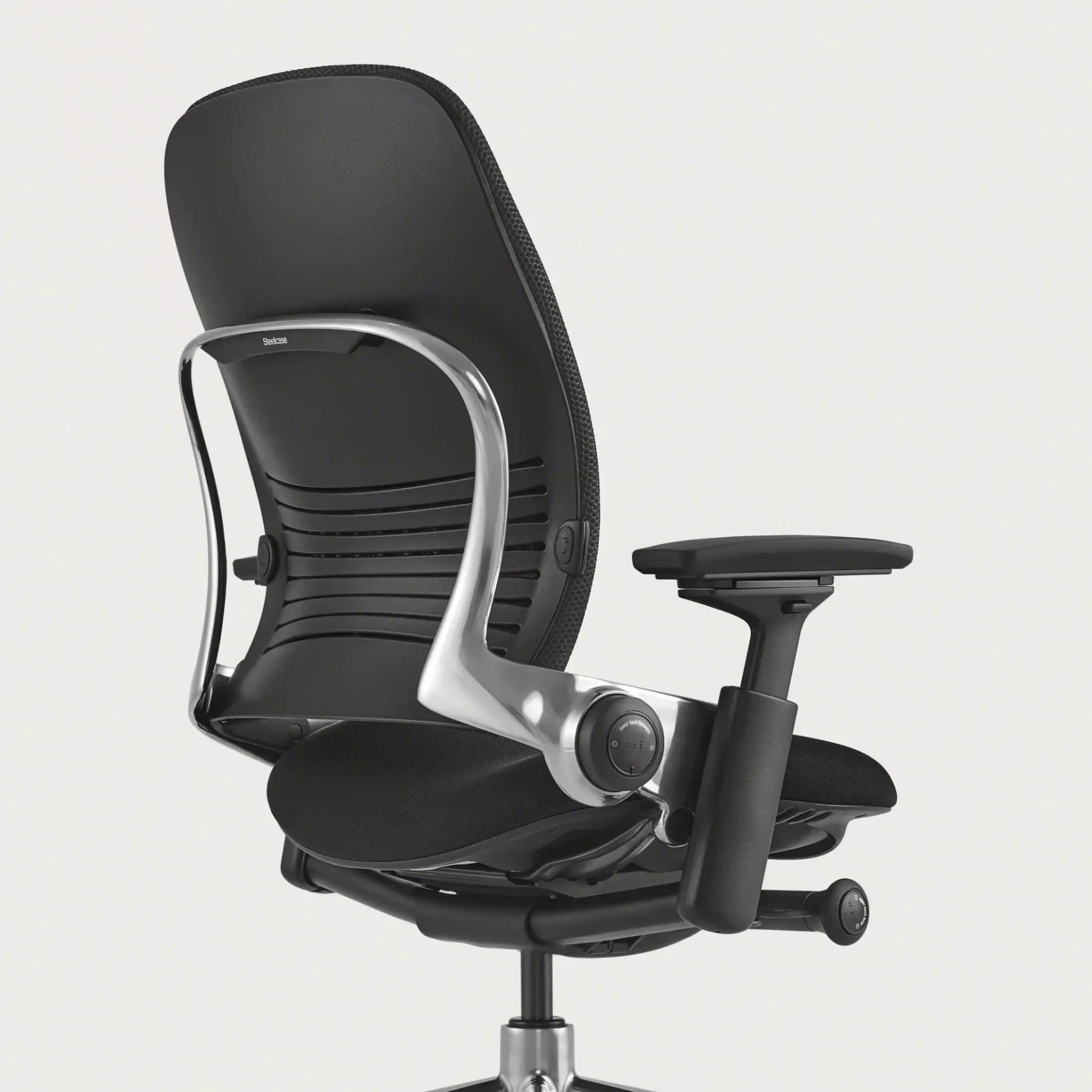 Close-up of the Leap Plus seat cushion showing contoured foam and fabric upholstery detail